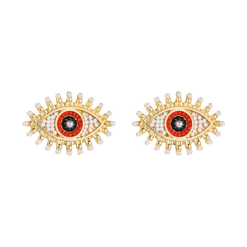 Wholesale Devil's Eye Alloy Inlaid Pearl Color Rhinestone Earrings